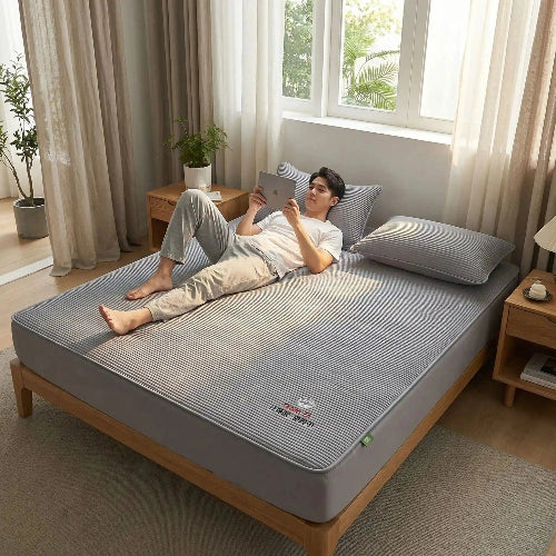 homme couché sur drap housse 90x190 cm gris coton naturel