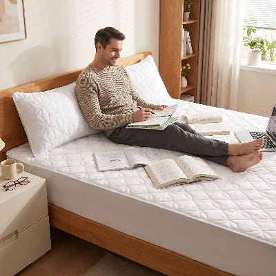 Étudiant avec cahiers sur surmatelas 90x190 blanc Design Patchwork