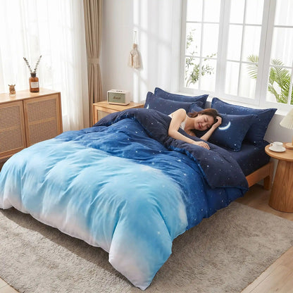 Femme endormie sur parure de lit bleue étoilée