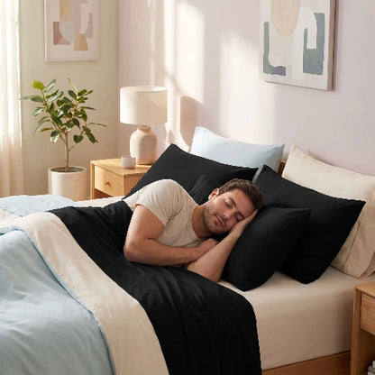 Homme endormi tête sur taies D Oreiller rectangulaires 50x70 noires 