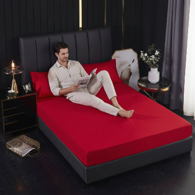 Homme lit sur drap housse 140x190  rouge antibactérien 