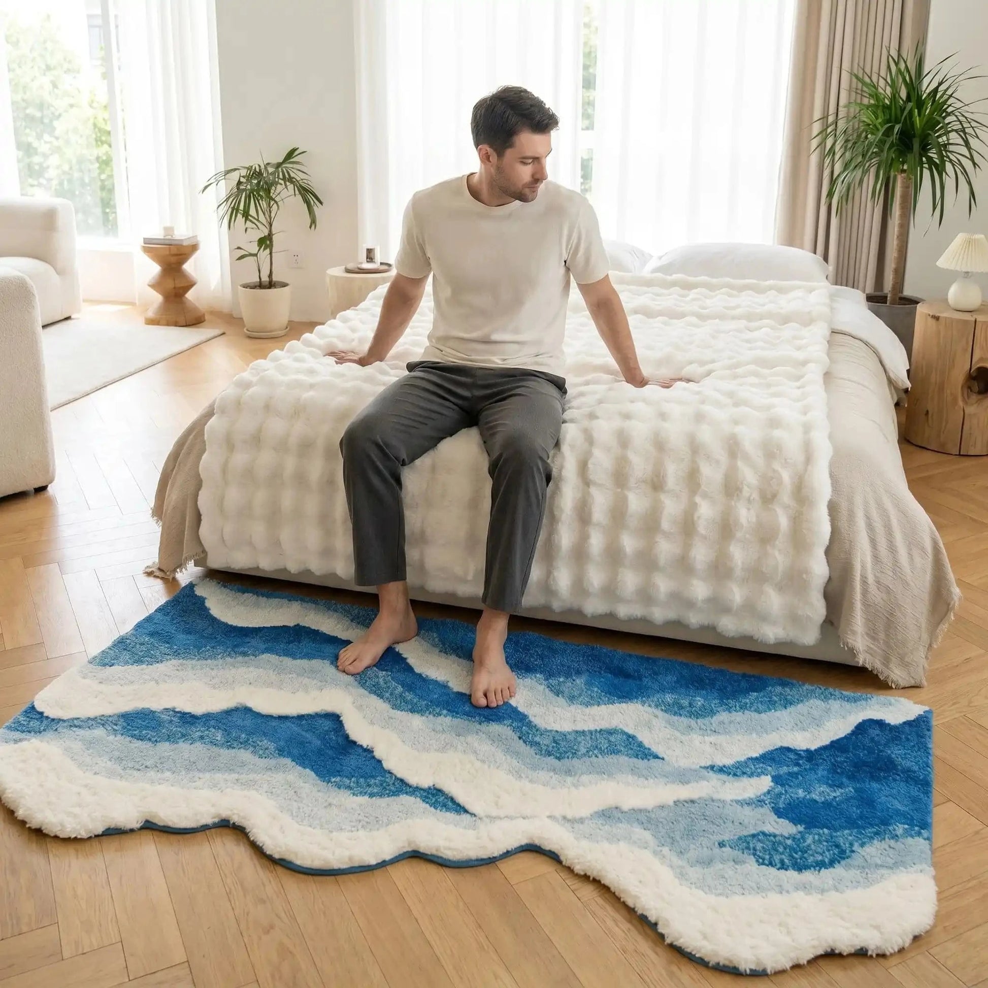 Homme sur lit pieds nus sur descente de lit douce antidérapante