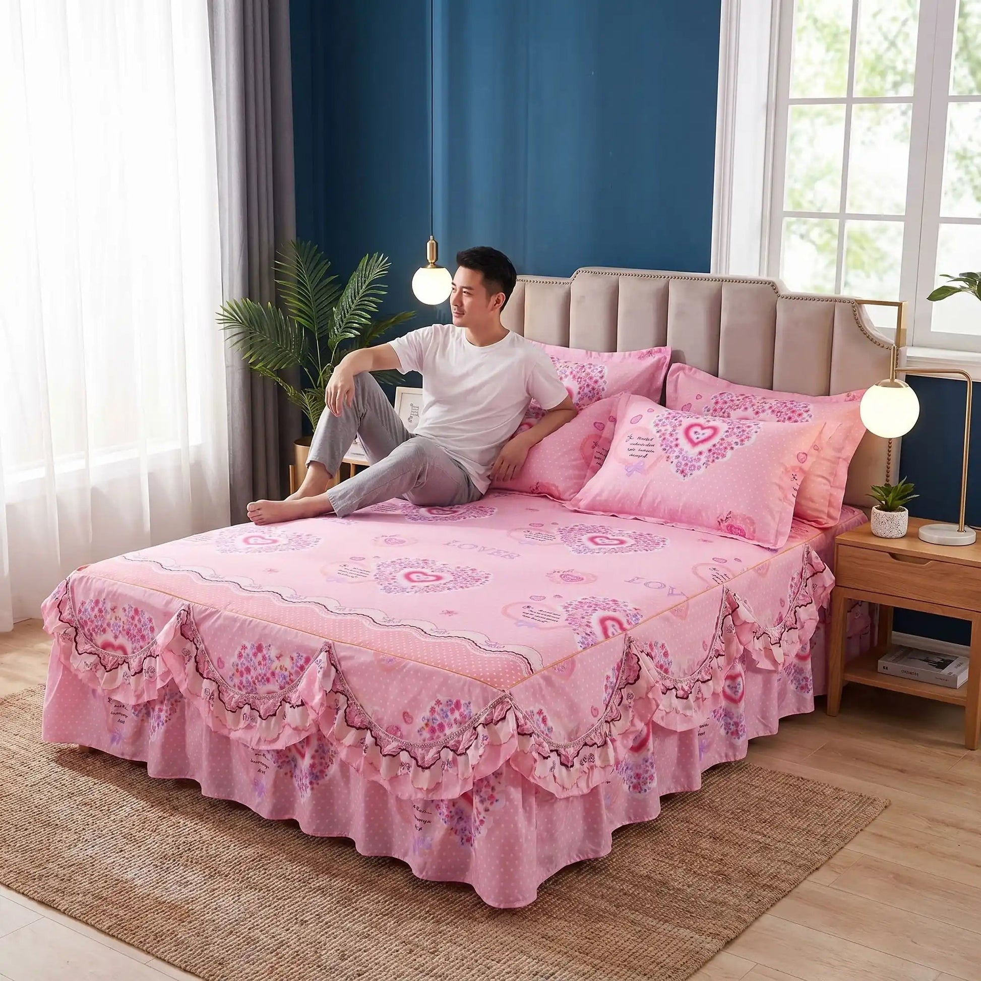 Homme sur parure de lit rose florale 