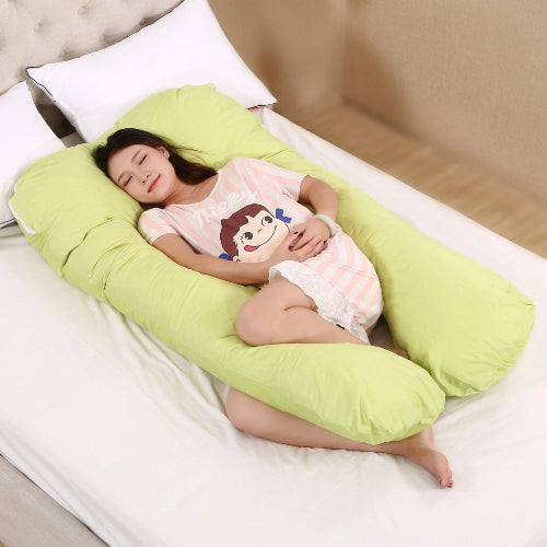 femme dort sur traversin haut de gamme vert