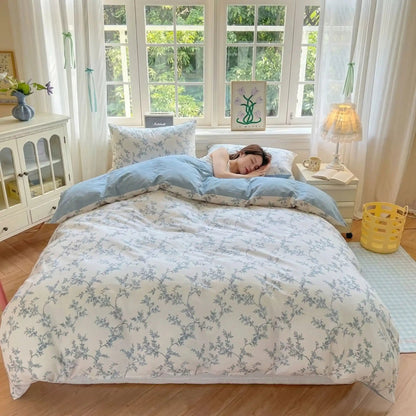 femme douceur d'intérieur housse de couette bleue florale coton