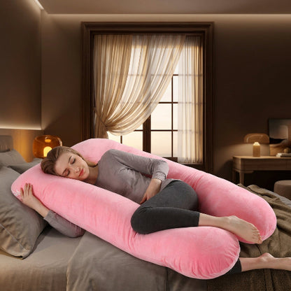 femme enceinte endormie sur traversin ergonomique rose