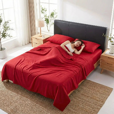 femme endormie sur drap housse 140x190 rouge antibactérien