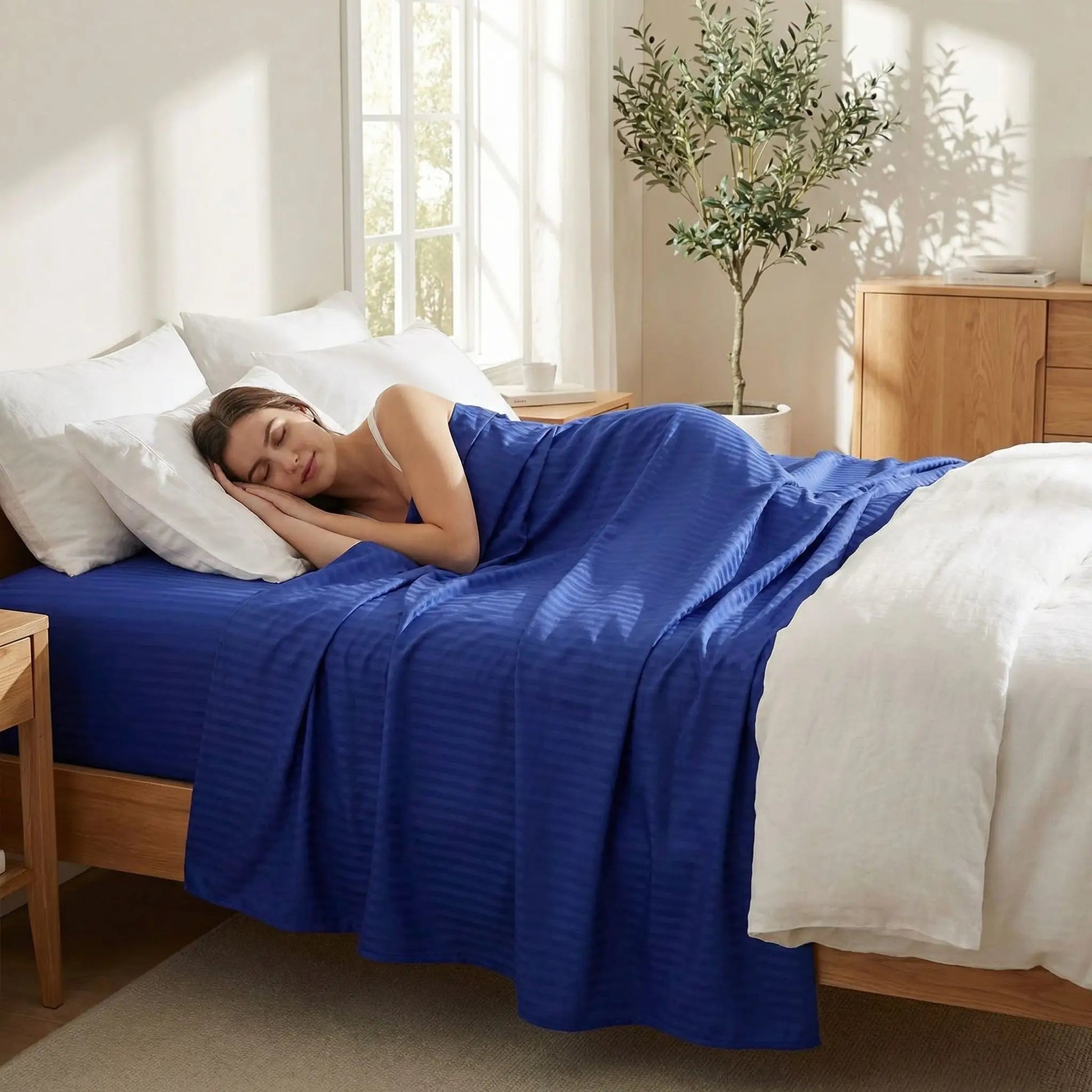 femme endormie sur drap plat coton 600 fils