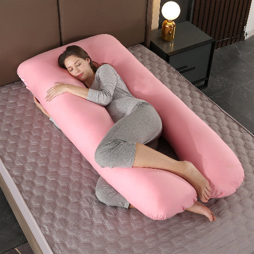 femme endormie sur traversin haut de gamme rose sur matelas