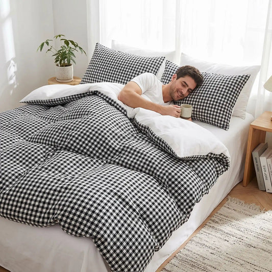 homme couché sous housse de couette 260x240 noire carreaux dentelle