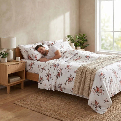 homme endormi sur drap plat blanc FloralÉcla™ 