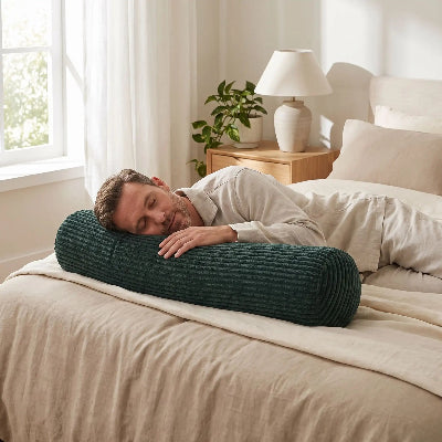 homme endormi tête sur traversin 90 cm gris vert 