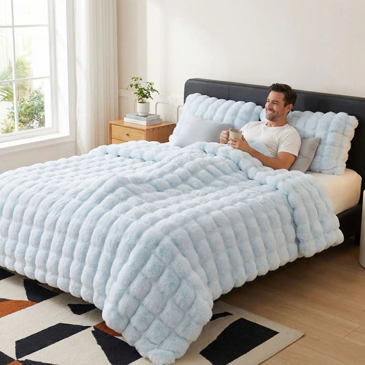 homme sous couverture bleu épaisse et chaude