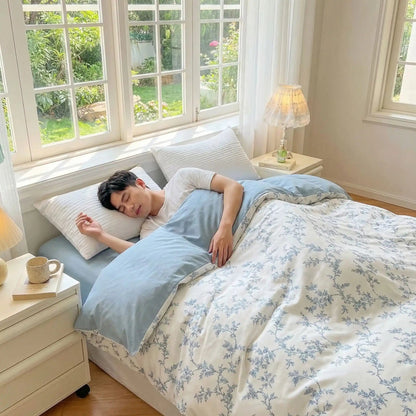 homme sous douceur d'intérieur housse de couette bleue florale coton