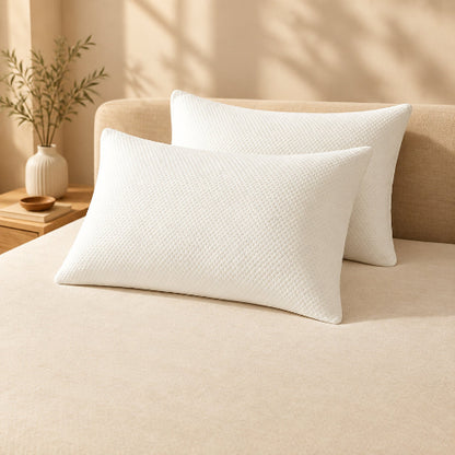 housse taie d'oreiller blanche sur lit