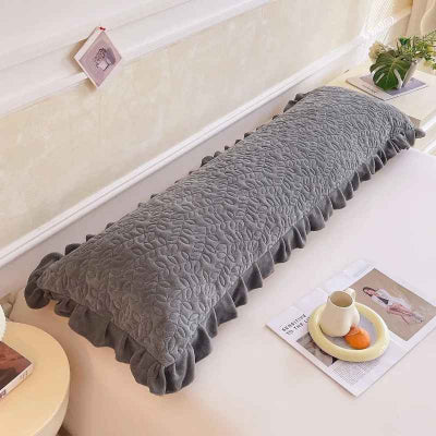 traversin FlexiComfort gris sur lit
